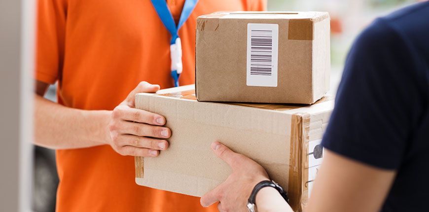 Shipping boxes labeled for Dubai and Saudi Arabia, illustrating FastShip’s hassle-free door-to-door DDP cargo and SABER compliance solutions.